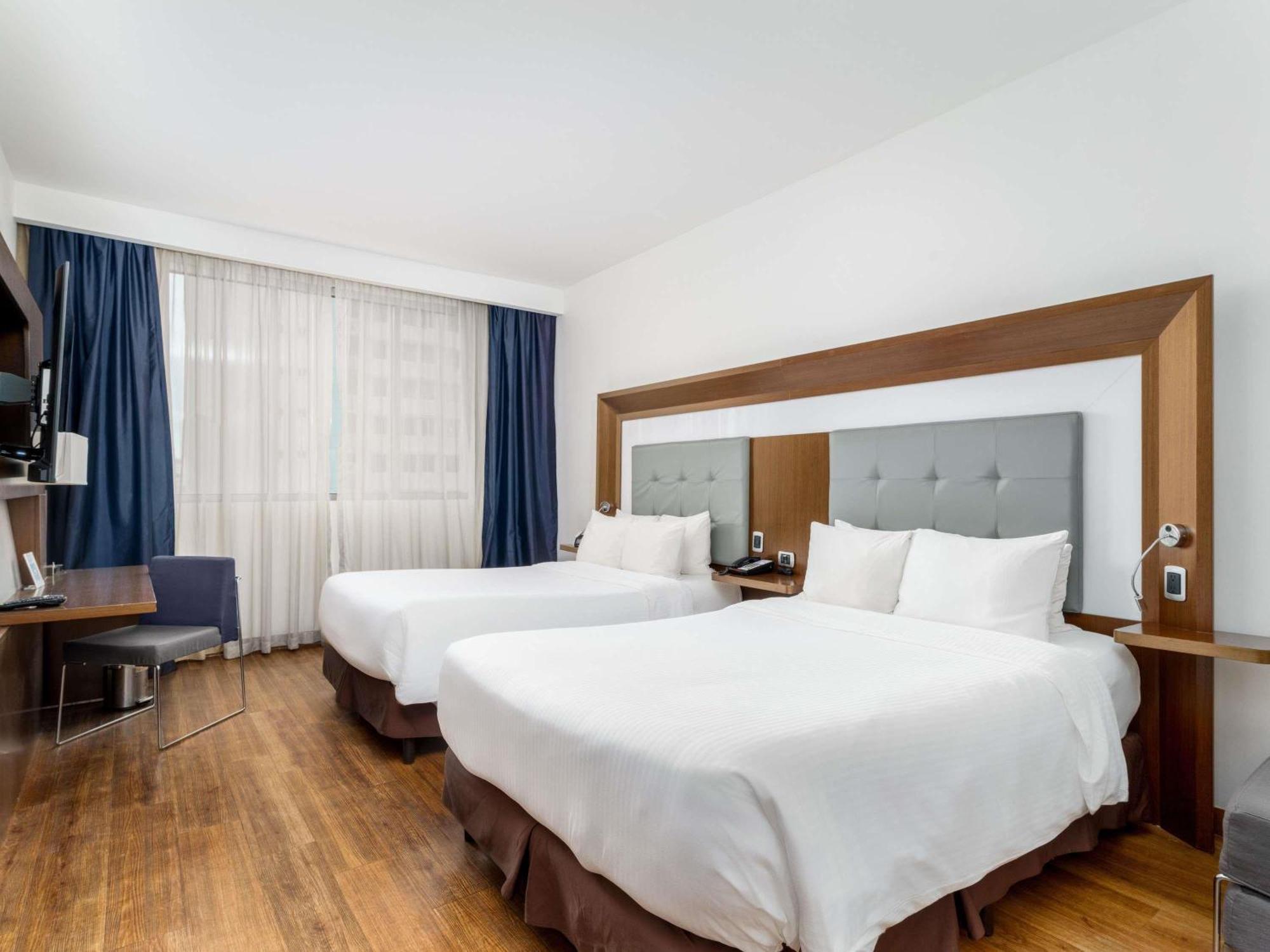 Executive Room Two Double Beds Sofa Bed,1722957868:JPEG